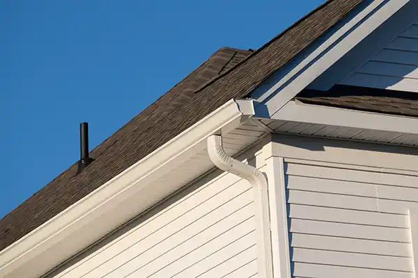 White, k-style gutter system on a home